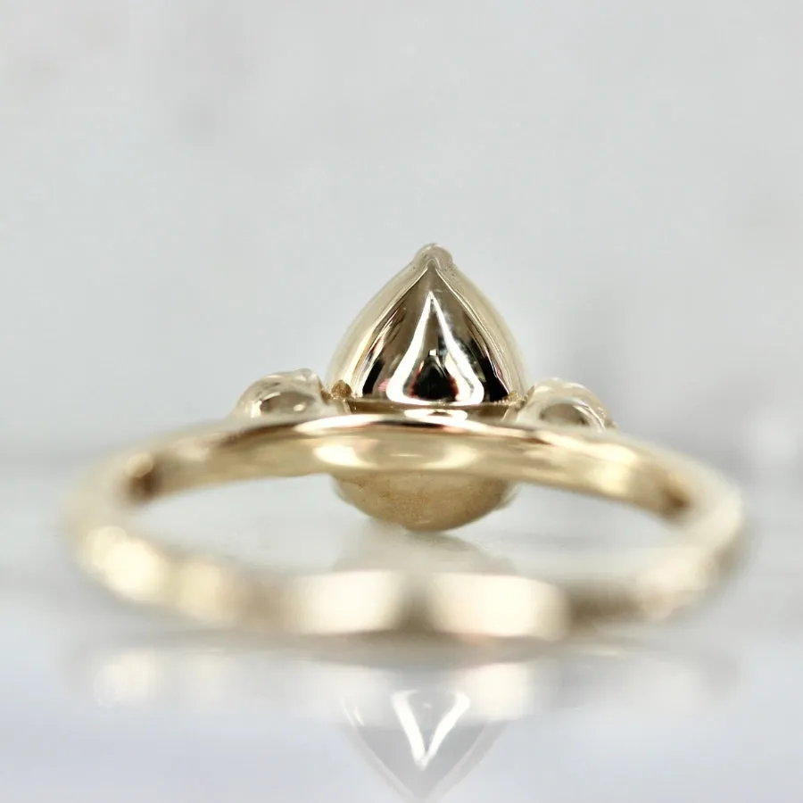 Blue Steel Pear Cut Sapphire Ring