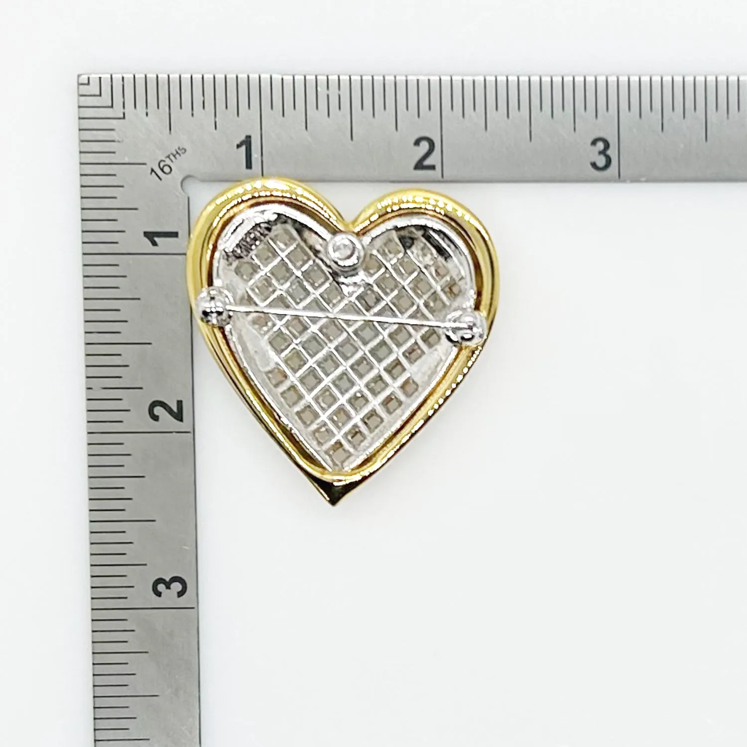 Dramatic Nolan Miller Sparkling Baguette Woven Look Heart Brooch