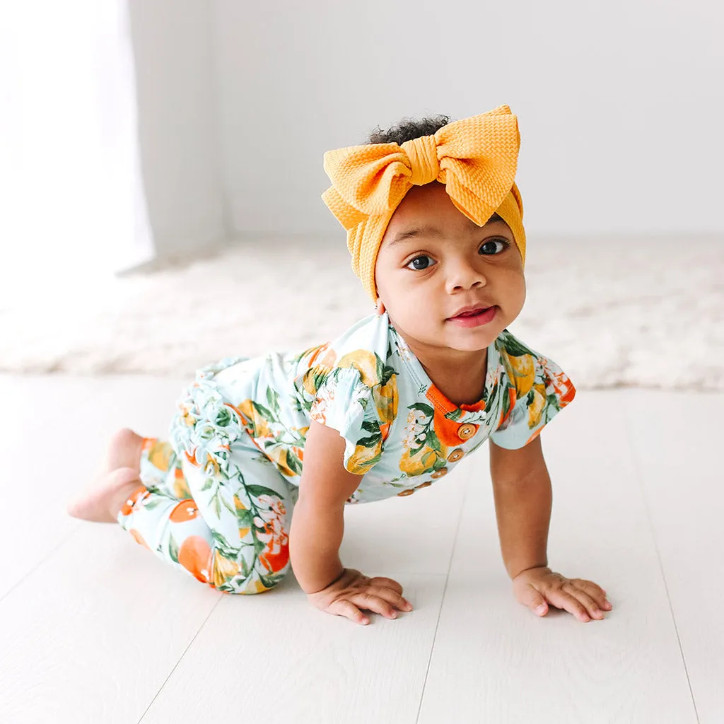 Posh Peanut Mirabella Ruffled Capsleeve Henley Romper
